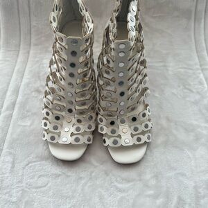 1. State White and Silver Cutout Heels